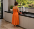 Torneira Elétrica Fame Elegance 4T de Parede 220V 5400W Preta/Branca