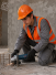 Esmerilhadeira Bosch GWS 700 710W com Punho Auxiliar